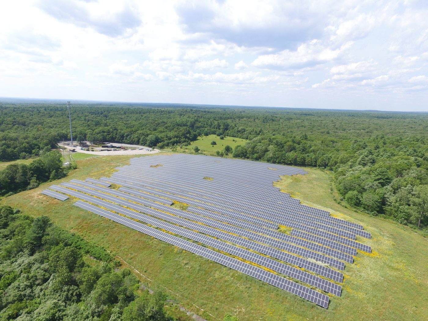 Bird's eye aerial view of a large solar farm