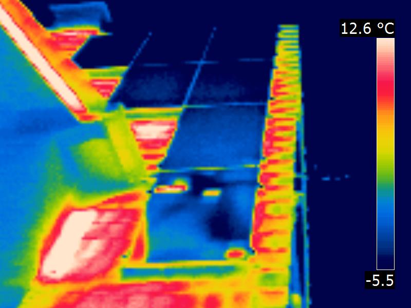 FLIR thermal close-up showing a solar cell hotspot